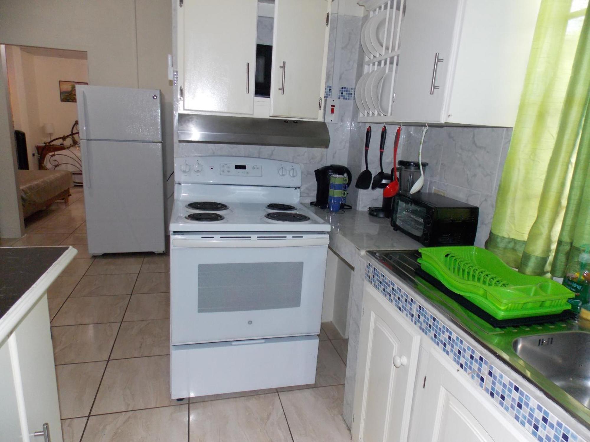Stewart Apt- Trincity, Airport, Washer, Dryer, Office, Cable , Wifi Værelse billede