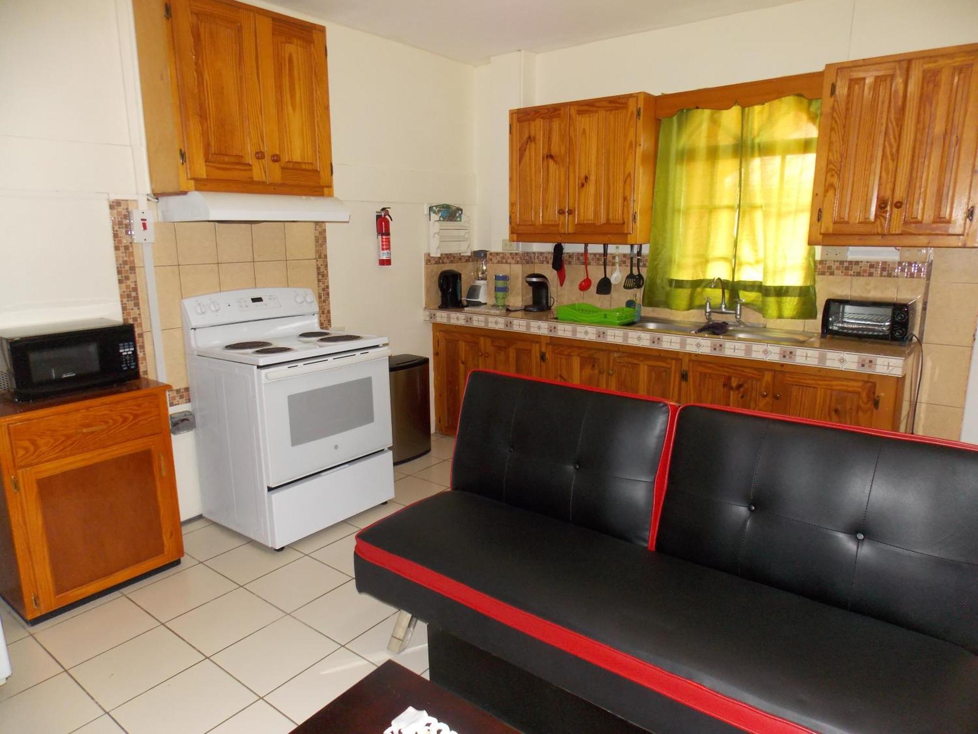 Stewart Apt- Trincity, Airport, Washer, Dryer, Office, Cable , Wifi Værelse billede